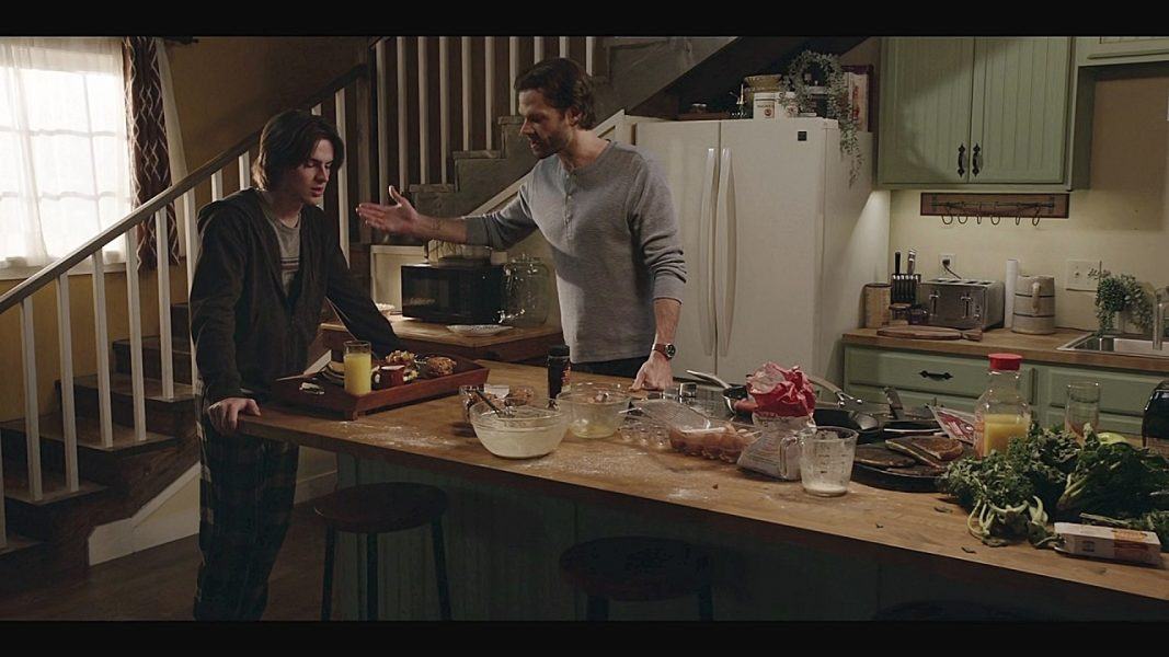 Walker gay Augie with Jared Padalecki in kitchen on set.